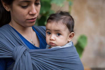 Fototapeta premium Single Mother Carrying Baby