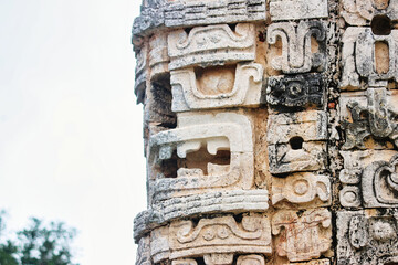 Characteristics of the Puuc style of Chaac Masks on the corner of the west building at the Mayan complex of Uxmal,Near Merida,Yucatan,Mexico