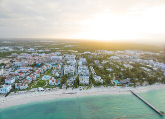 A beach with a city in the background