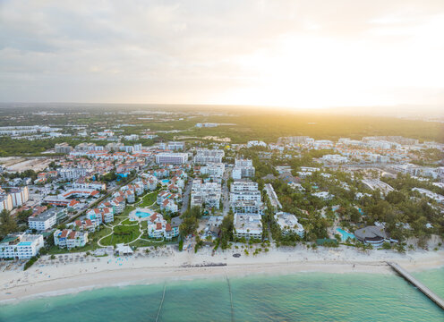 A beautiful beach with a city in the background
