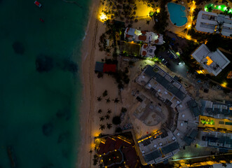 A beach with a city in the background