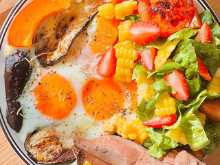 Sunny side up eggs with vegetables and sweet potato for breakfast. Delicious food.Cooking recipes. Healthy meal.Diet food.Healthy recipes.Diet food dish. Protein egg.