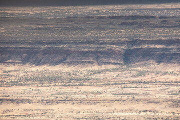Aerial views of the landscape surrounding Kings Canyon, Watarrka National Park - Northern Territory.	