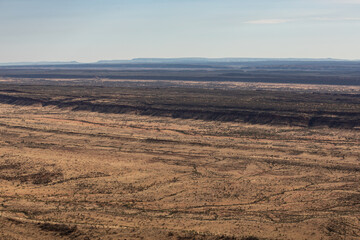 Aerial views of the landscape surrounding Kings Canyon, Watarrka National Park - Northern Territory.	