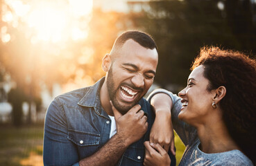 Happy, morning and couple in park laughing together for bonding, funny joke and conversation....