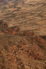 Aerial views of the landscape surrounding Kings Canyon, Watarrka National Park - Northern Territory.	