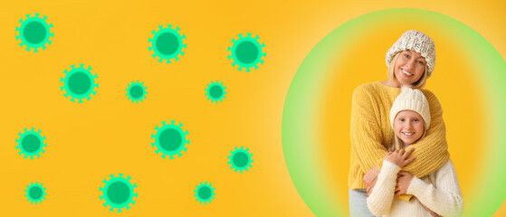 Beautiful woman and her cute daughter in stylish sweaters and hats on yellow background