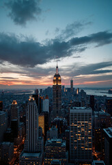 Naklejka premium Breathtaking cityscape at dusk with illuminated skyscrapers, urban beauty