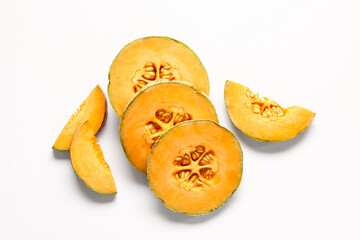 Pieces of sweet melon on white background
