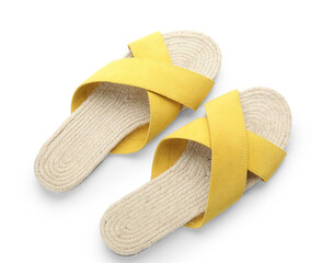 Stylish yellow sandals on white background