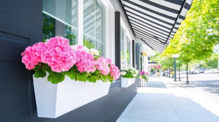 A charming storefront with a striped awning and flower boxes, inviting customers to browse local businesses and enjoy a personalized shopping experience.