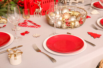 Christmas table setting with beautiful decorations