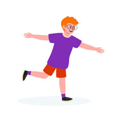 Young boy happily dancing outdoors wearing a purple shirt and red shorts