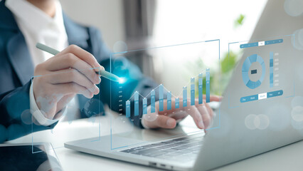 Analyst working with computer in Business Analytics and Data Management System with KPI and metrics connected to the database for technology finance, operations, sales, marketing. Data analysis.Ai