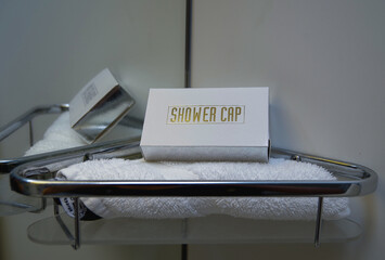 Bathroom amenities as shower cap hat and face cloth towel onboard classic  cruiseship cruise ship...