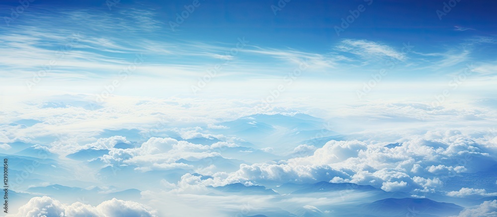 Aufkleber aerial view from an airplane window showcasing soft white clouds spread across a vibrant blue sky cr