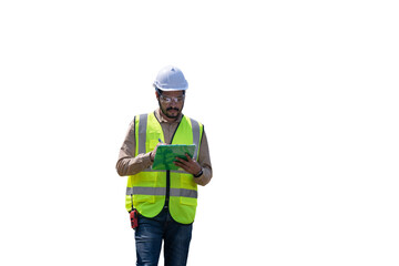 Engineers wearing safety gear, including hard hats examining survey standing industrial facility...