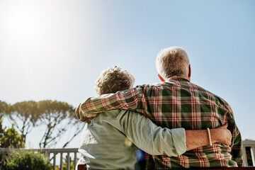 Hugging, back and senior couple outdoor at holiday house together for retirement celebration. Love, bonding or elderly man and woman embrace by balcony on anniversary vacation for marriage connection