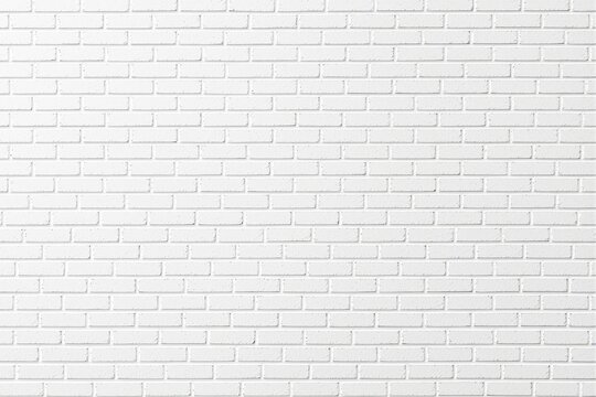 Fototapeta White brick wall texture on a clean background.