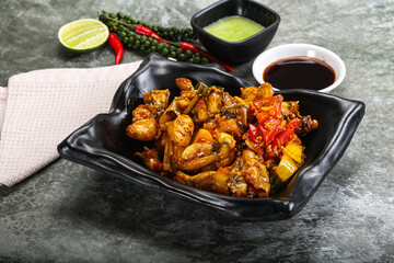 Vietnamese cuisine - fried frog with vegetables