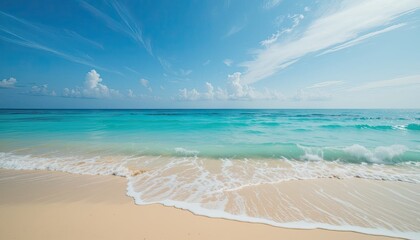 beach scene featuring soft, golden sand gently kissed by the turquoise waves of the ocean