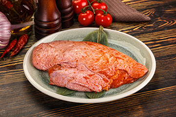 Raw marinated duck breast for cooking
