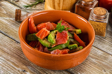 Salad with avocado and salmon
