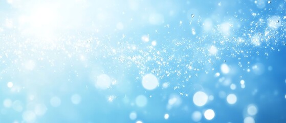 A blue sky with white clouds and a blue ocean