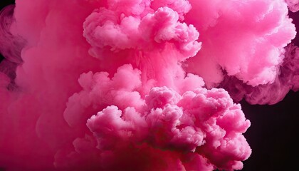 Fototapeta premium Exploding Pink Smoke: A vibrant display of swirling pink smoke erupts, creating a dramatic and eye-catching spectacle against a dark backdrop, capturing movement and artistic beauty.