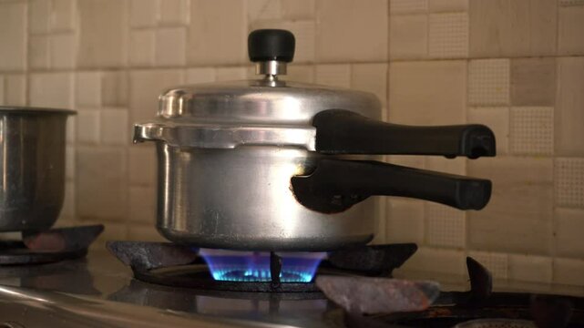 Cooker on the stove, Indian kitchen 