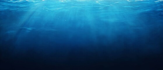 Obraz premium A blue ocean with a light shining on it