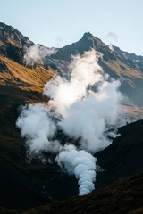 Fototapeta premium Steam Rising from Geothermal Area in Mountain Valley at Sunrise