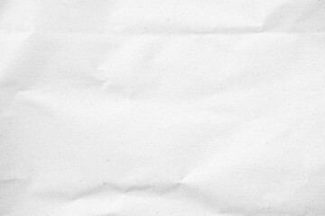 White recycled craft paper texture as background. Grey paper texture, Old vintage page or grunge vignette of old newspaper. Pattern rough art creased grunge letter. Hardboard with copy space for text.