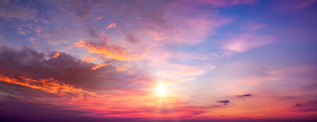 Fototapeta premium Sunset sky background. Panoramic view of sunset sky.
