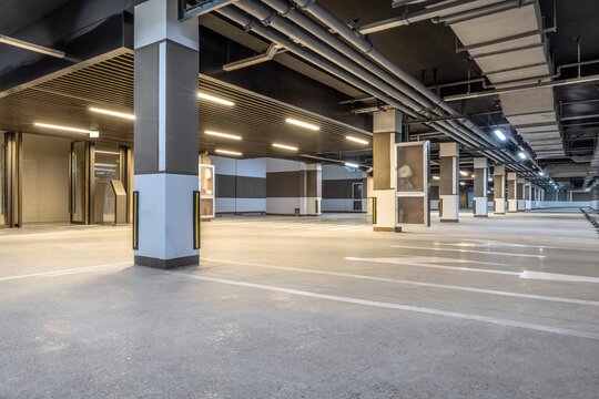 Empty modern underground parking lot interior