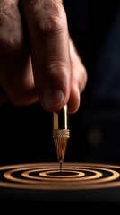 Obraz premium A hand precisely placing a pen on a concentric circle pattern.