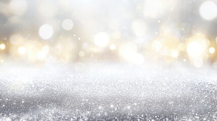 Fototapeta premium Blurred holiday sparkle background with silver and white shimmering lights.