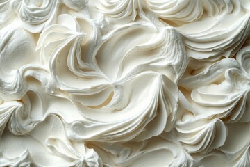 Obraz premium Creamy swirls of whipped topping showcasing texture and softness in a culinary context
