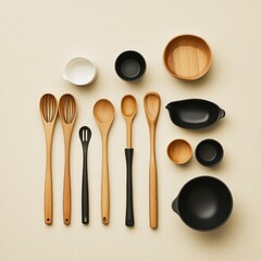 Wooden and black kitchen utensils, arranged