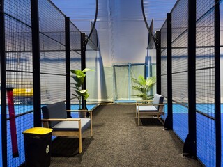 an indoor paddle tennis court