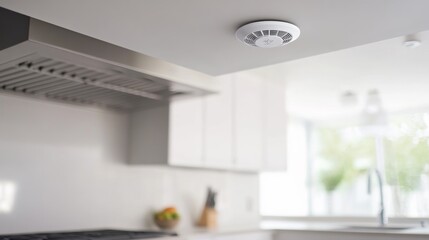 Carbon monoxide sensor in a modern kitchen near the stove. Featuring kitchen safety and prevention