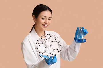 Female inventor with chemical flask and molecular model on beige background