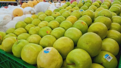 green apples in a market
