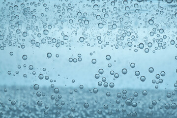 Refreshing soda water as background, closeup view