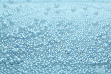 Refreshing soda water as background, closeup view