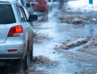 Snowmelt and Drainage Issues Causing Traffic Disruptions and Road Hazards.