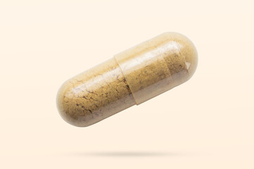 Herbal medicine capsule flying on brown background