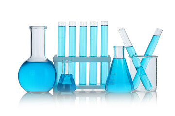 Laboratory glassware with blue liquid isolated on white