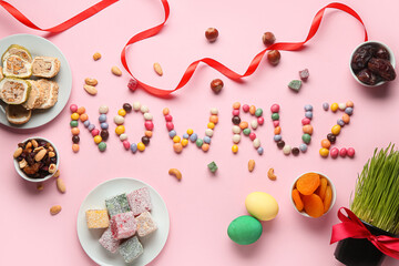 Composition with word NOWRUZ made of colorful candies and traditional sweets on pink background. Nowruz Bayram celebration
