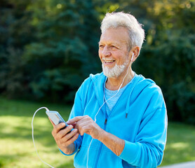 man outdoor senior  elderly phone fitness mobile smartphone music earphone app communication active fun old nature using internet connection smart phone mature retirement listen headphone training